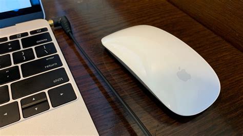 Effortlessly switch between wireless and wired with the Magic Mouse's built-in wire